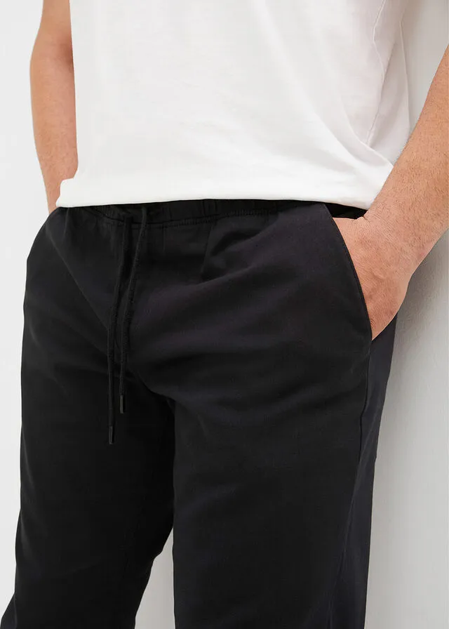 Pantalón elástico tipo chino de corte holgado con pernera recta Negro